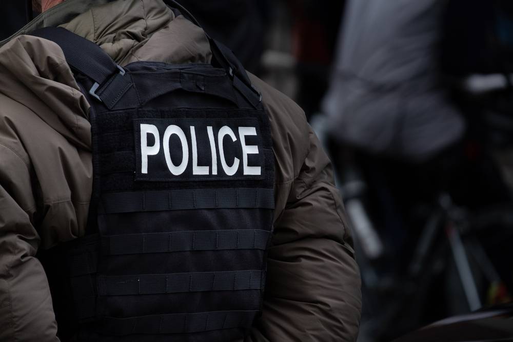 A,Male,Police,Officer,Stands,In,Winter,Down-filled,Uniform,Clothing